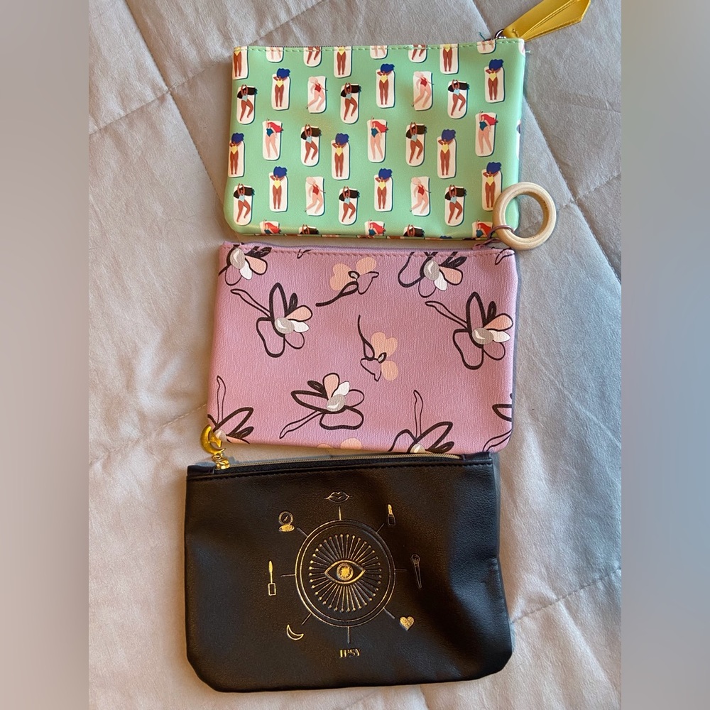 3 brand new Ipsy zipper pouches.